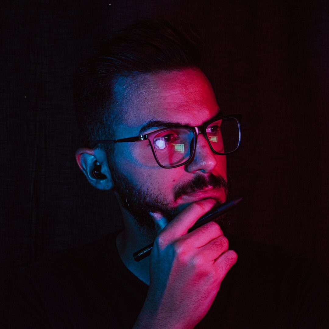 Portrait of a man with glasses and a beard