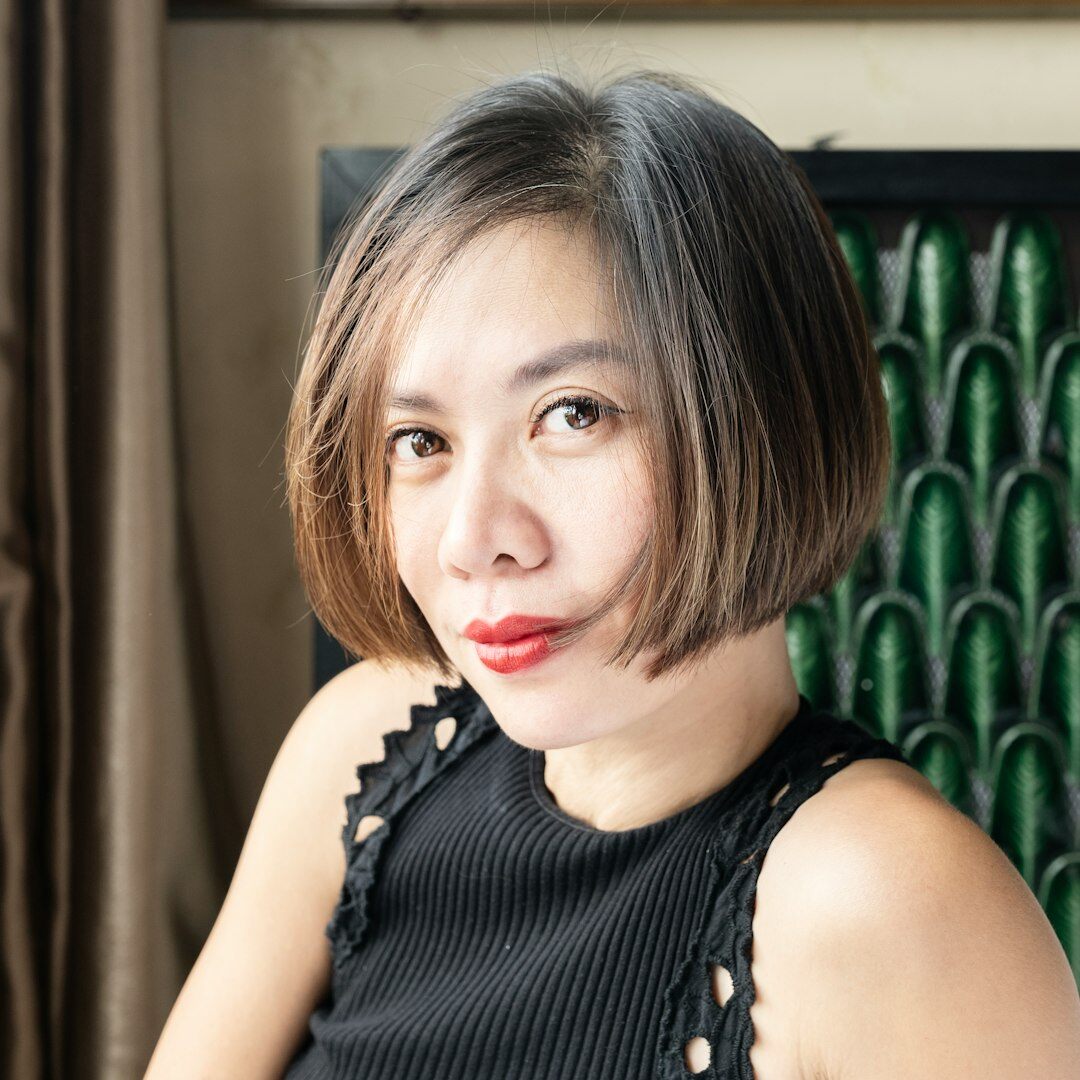 Portrait of a professional woman with short hair smiling