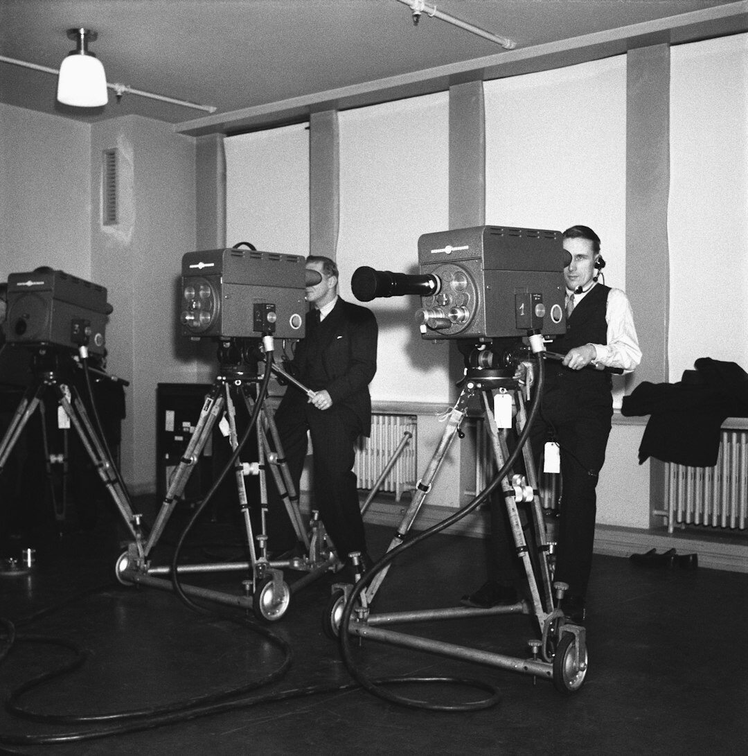 Vision mixer operator at a multicamera switcher desk