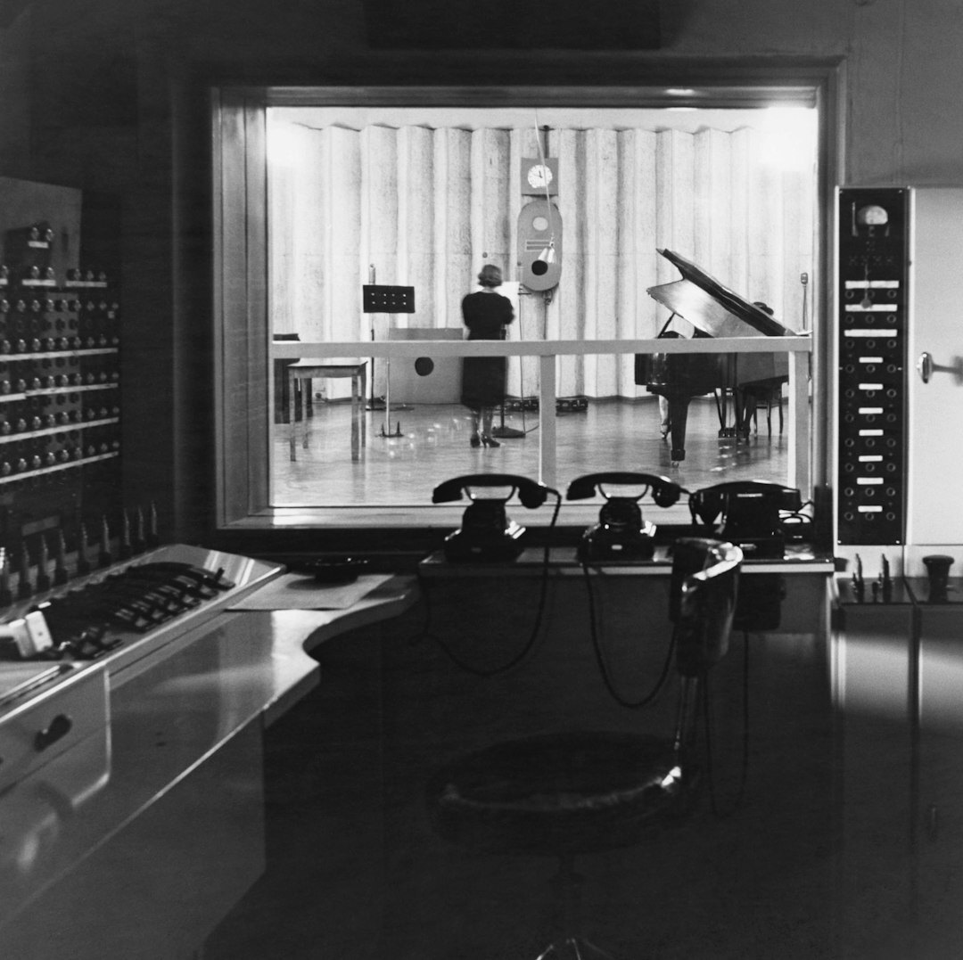 Director monitoring multiple camera feeds in a TV control room