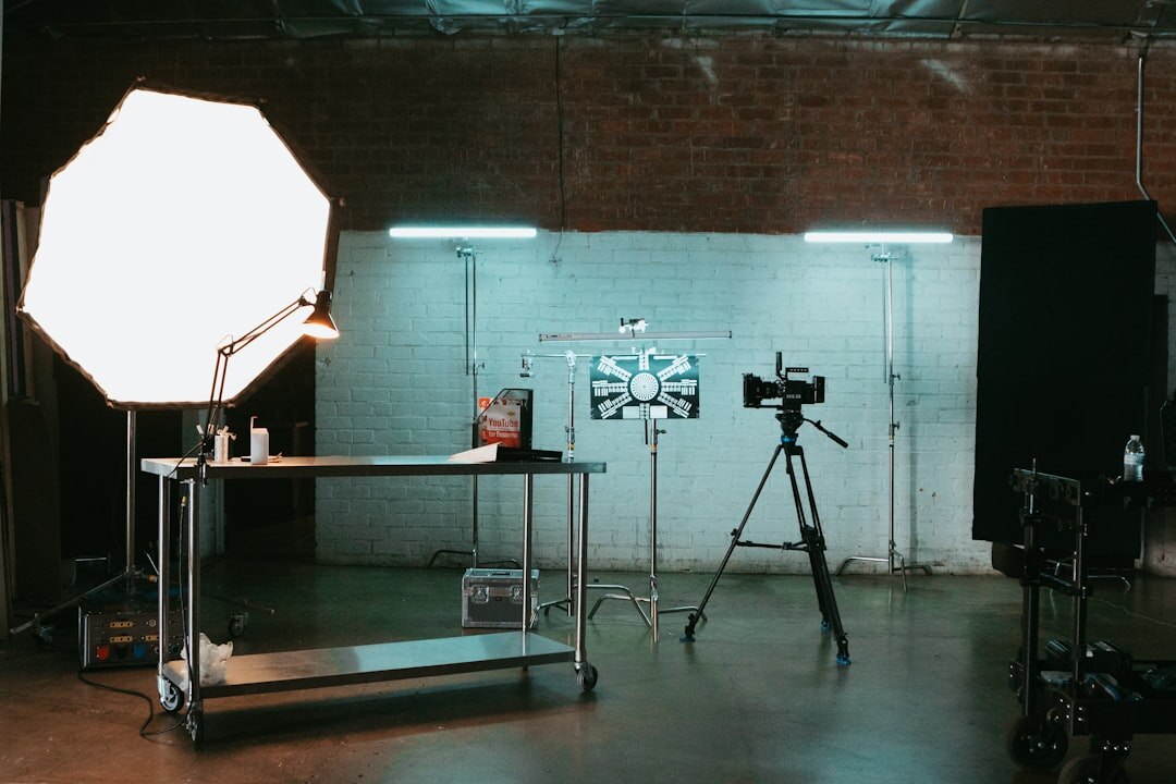 Professional broadcast cameras on a lit TV studio floor