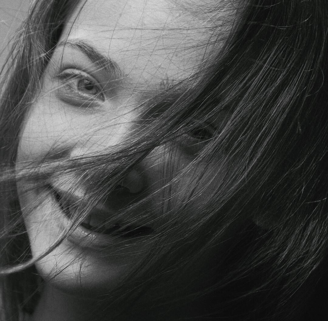 Portrait of a woman with long dark hair