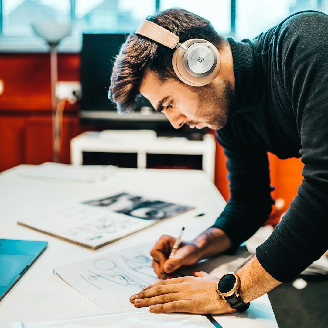 Portrait of a man with short hair in a headset